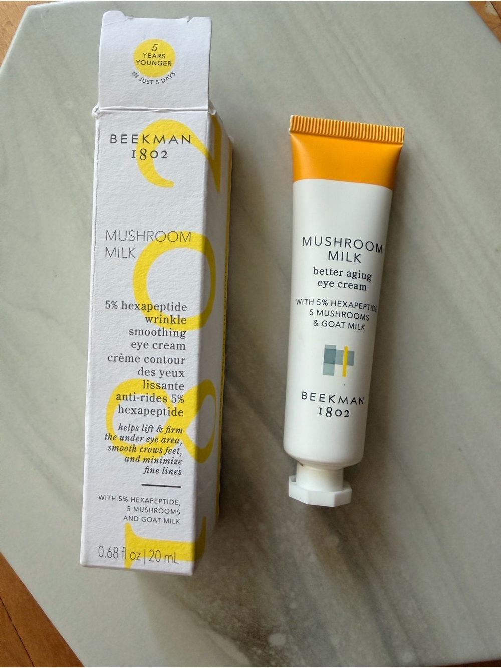 Beekman 1802 Mushroom Milk Eye Cream - Yellow & White Tube
